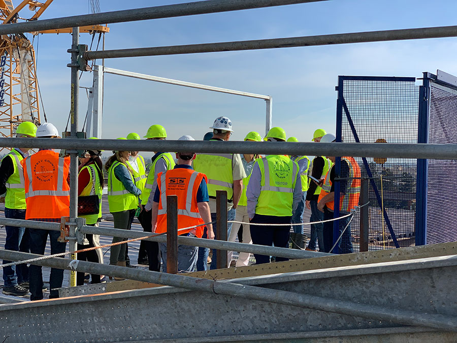 BDG Topping off - group gathering for the placement of steel beam