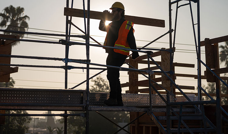 Man walking on construction site (for OpenSpace article)